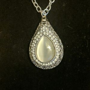 Large grey and silver tone pendant with crystals